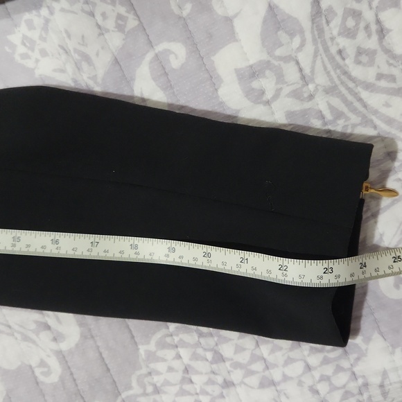 Classic black Tahari blazer with white trim, zipper pockets and sleeves. - Picture 9 of 12